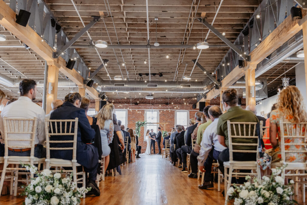 JX Venue wedding ceremony from down the aisle