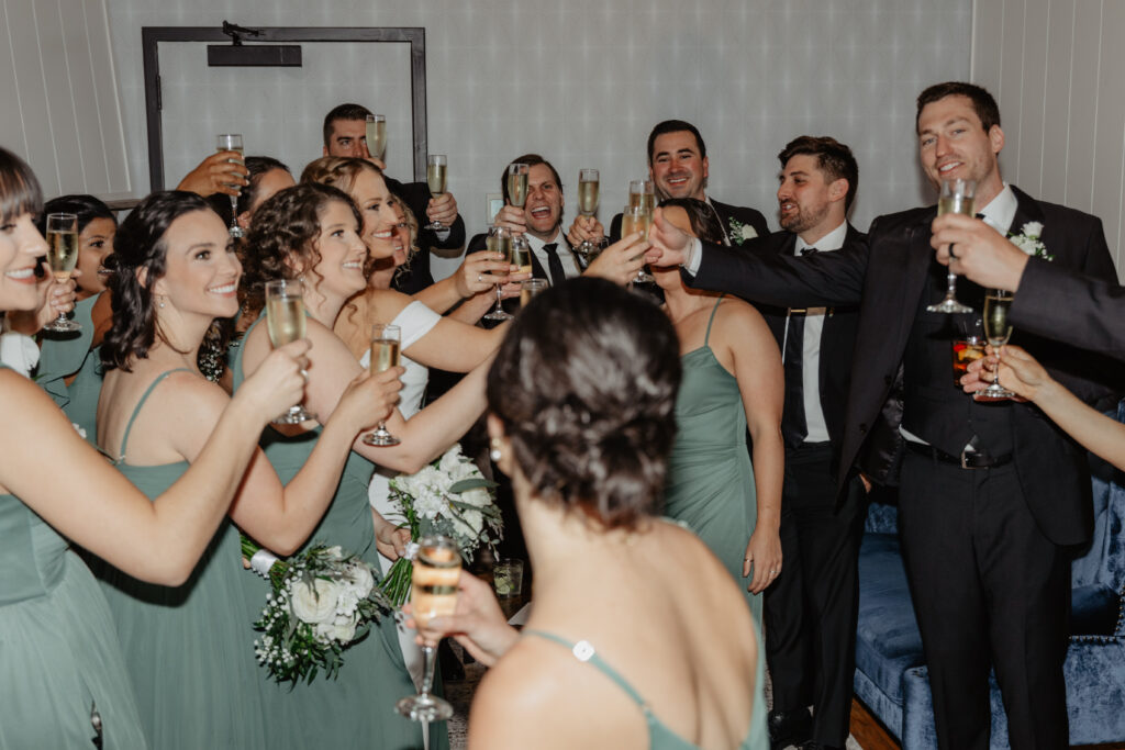 wedding party champagne toast celebration after ceremony