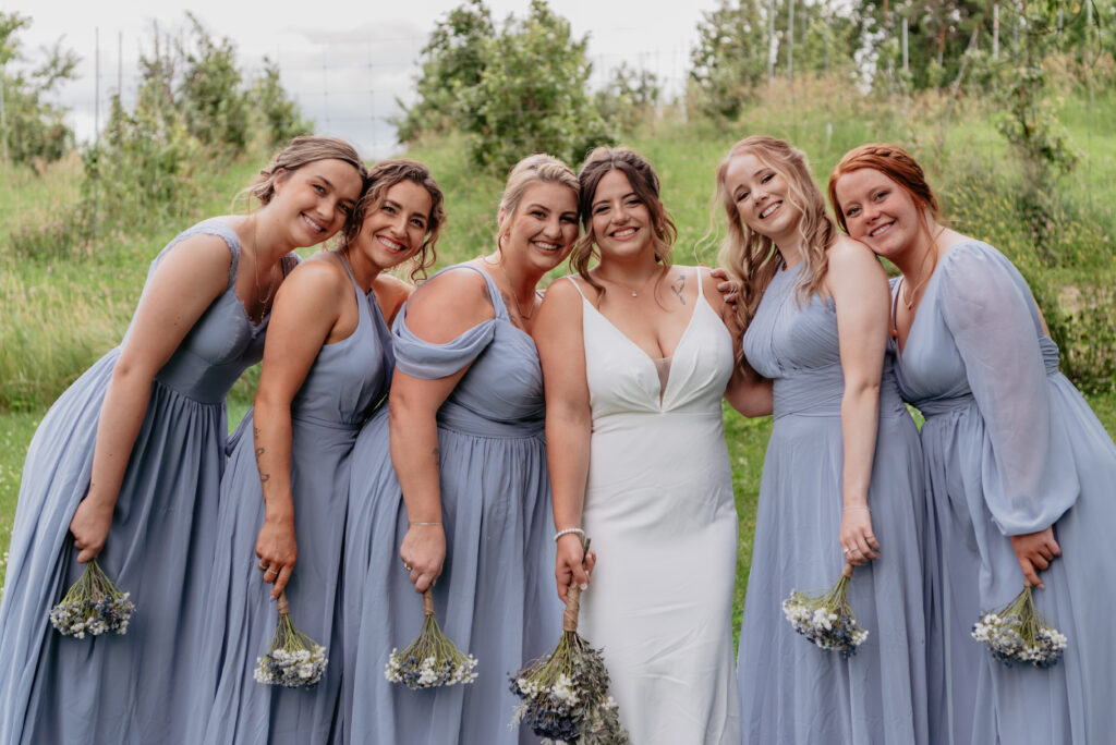 traditional bridesmaid portrait with light blue bridesmaid dresses