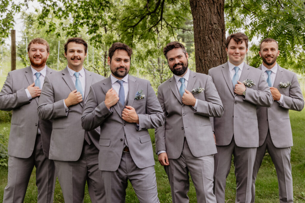 traditional groomsmen portrait with gray suits